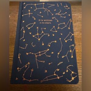 This is a DesignWorks Ink navy constellations cloth journal